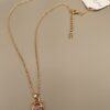 Collier Chat rose